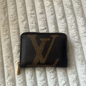 Louis Vuitton Black Wallet with Gold Logo